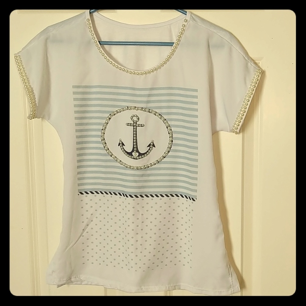 adorable top detailed with beads.
